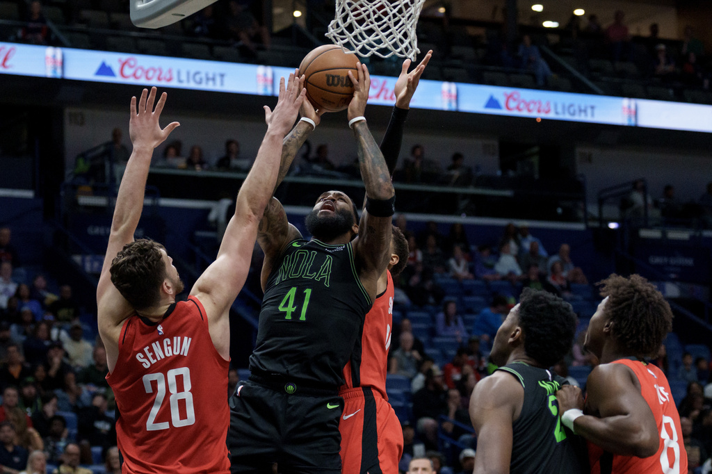 New Orleans Pelicans guard Saddiq Bey (41) shoots against Houston Rockets center Alperen Sengun (28) during the second half of an NBA basketball game in New Orleans, Sunday, March 29, 2026. (AP Photo/Matthew Hinton)