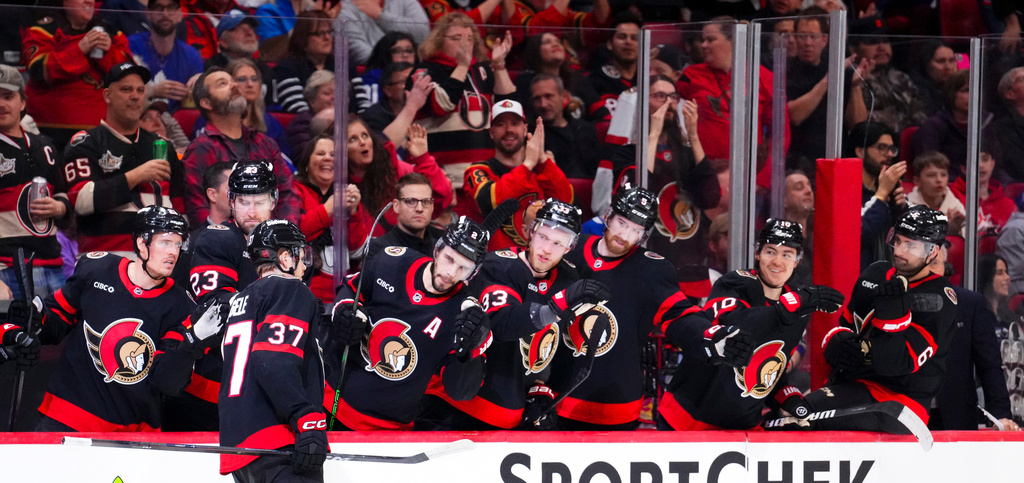 Ottawa Senators' Warren Foegele (37) celebrates his goal with teammates while taking on the Toronto Maple Leafs during the second period of an NHL hockey game in Ottawa, Wednesday, April 15, 2026. (Sean Kilpatrick/The Canadian Press via AP)