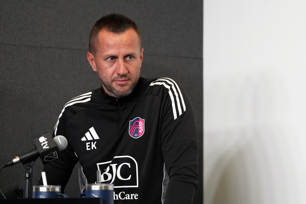 Bosnia-born assistant coach with MLS team St. Louis City Elvir Kafedzic translates during a news conference for the Bosnia national soccer team Friday, June 5, 2026, in St. Louis, ahead of the World Cup soccer tournament. (AP Photo/Jeff Roberson)