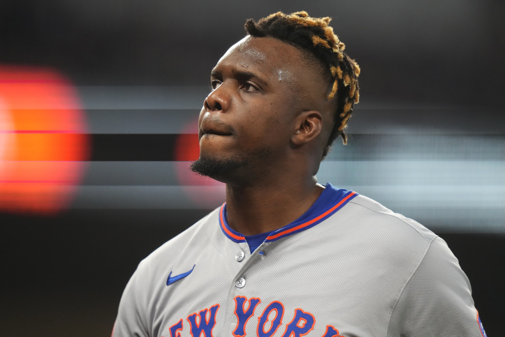 New York Mets relief pitcher Huascar Brazoban walks from the mound after being relieved during the third inning of a baseball game against the Miami Marlins, Sunday, Sept. 28, 2025, in Miami. (AP Photo/Lynne Sladky)