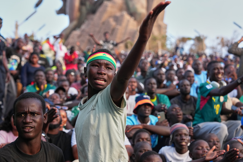 A Senegalese fan reacts as he watches a broadcast of the World Cup Group I soccer match between Senegal and France in Dakar, Senegal, Tuesday, June 16, 2026. (AP Photo/Misper Apawu)