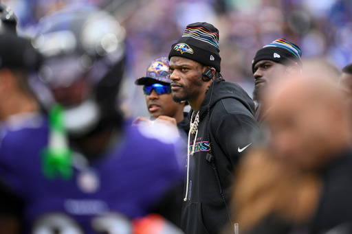 Baltimore Ravens quarterback Lamar Jackson looks on from the sidelines during the first half of an NFL football game against the Los Angeles Rams Sunday, Oct. 12, 2025, in Baltimore. (AP Photo/Nick Wass) Baltimore Ravens quarterback Lamar Jackson looks on from the sidelines during the first half of an NFL football game against the Los Angeles Rams Sunday, Oct. 12, 2025, in Baltimore. (AP Photo/Nick Wass)