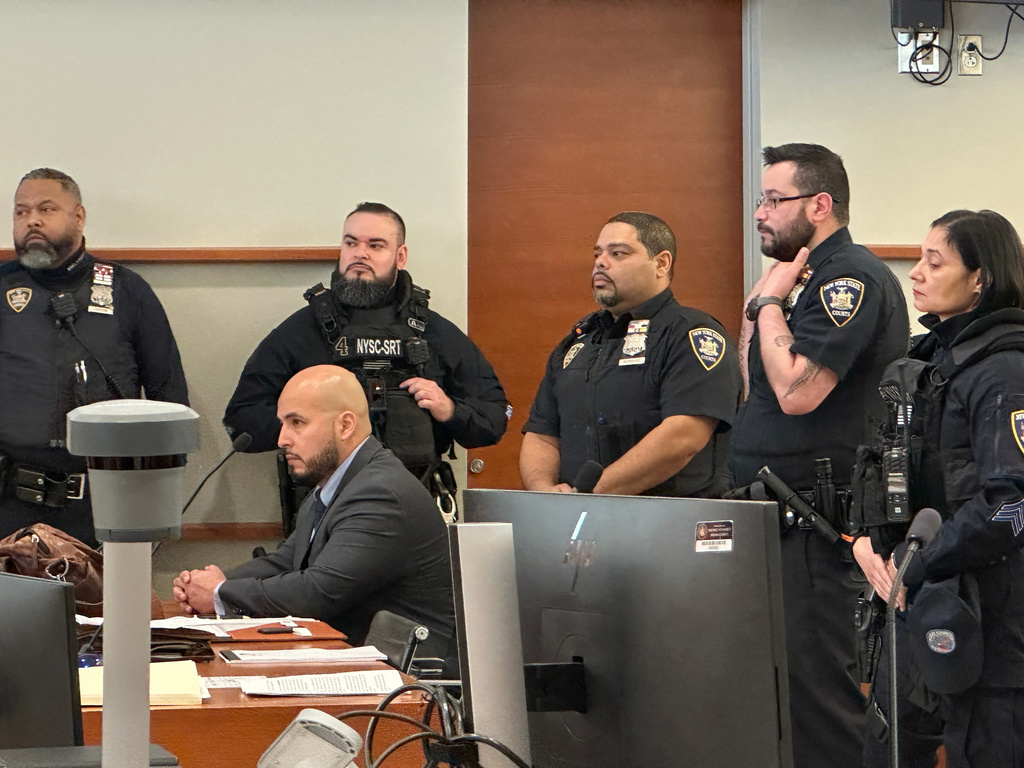 Former New York City police sergeant Erik Duran is seated during his sentencing hearing at the Bronx County Hall of Justice Thursday, April 9, 2026, New York, for tossing a picnic cooler full of drinks at a fleeing suspect, Eric Duprey, who then crashed his motorized scooter and died. (AP Photo/Michael R. Sisak)