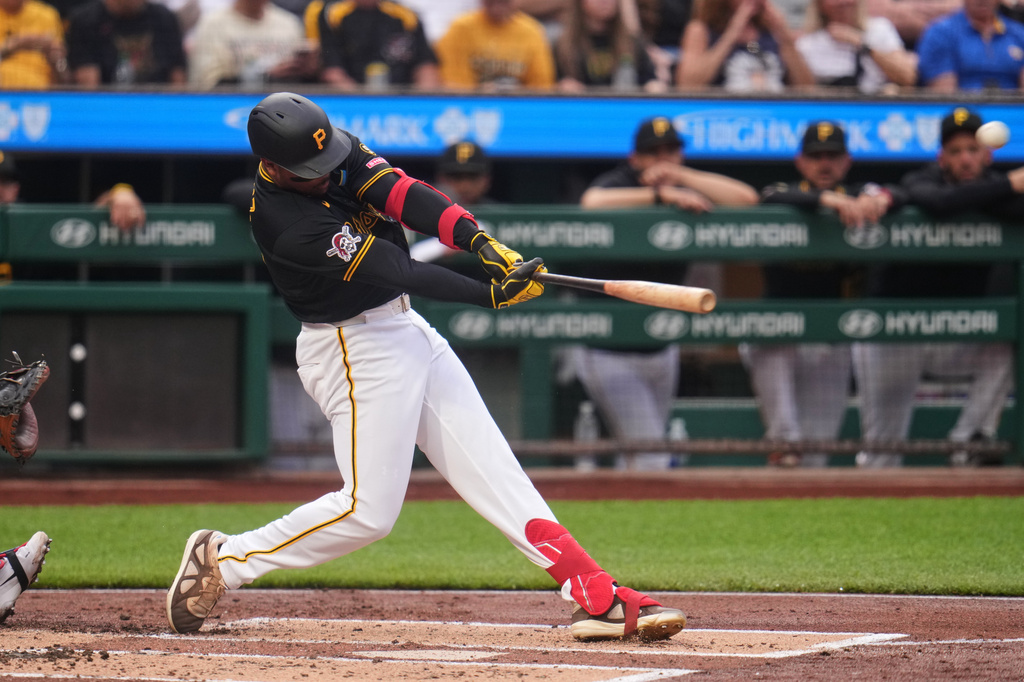 Pittsburgh Pirates' Esmerlyn Valdez hits a two-run home run off Chicago Cubs pitcher Jordan Wicks during the first inning of a baseball game in Pittsburgh, Tuesday, May 26, 2026. (AP Photo/Gene J. Puskar)