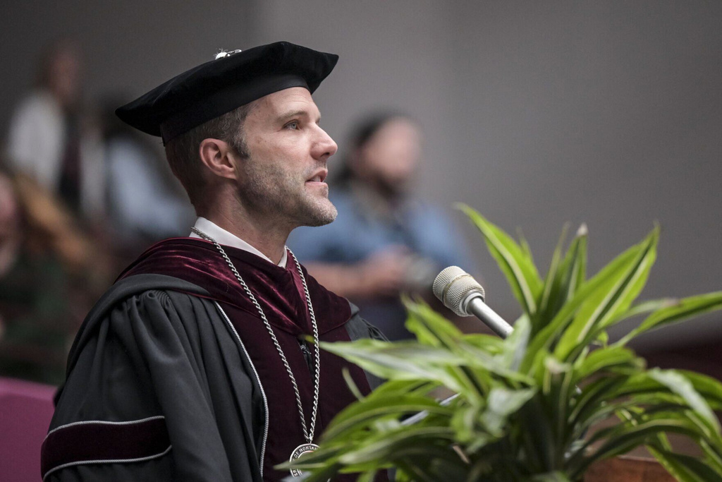 FILE - University of Montana President Seth Bodnar speaks during spring commencement at the Adams Center in Missoula, Mont., on May 10, 2025. (Ben Allan Smith/The Missoulian via AP, File)