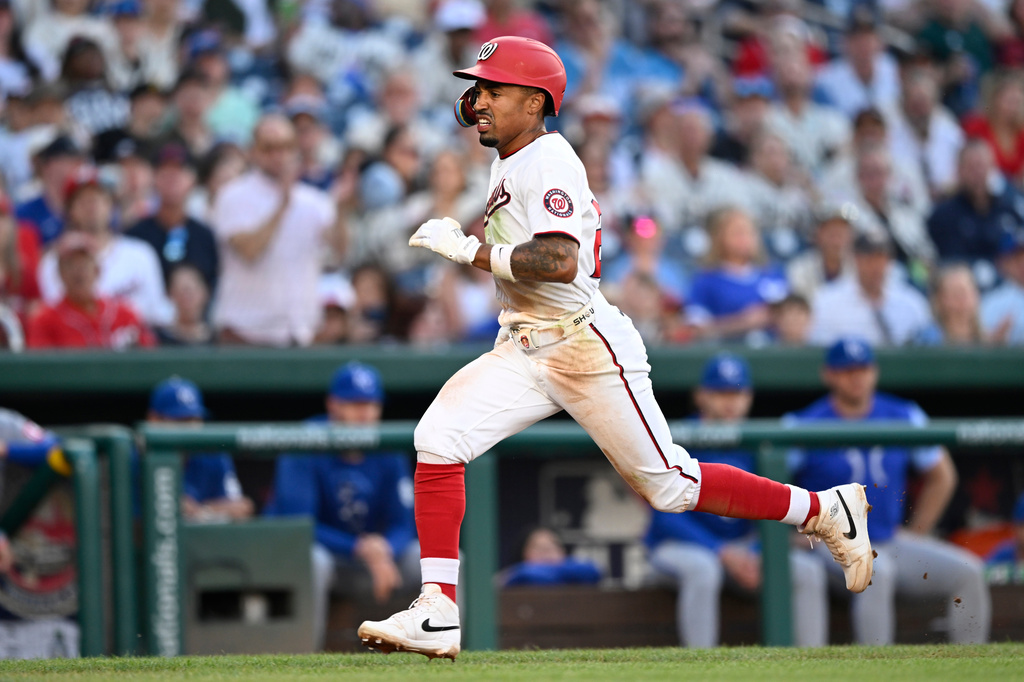 Washington Nationals' Nasim Nuñez heads to home for a score during the third inning of a baseball game against the Kansas City Royals, Tuesday, June 16, 2026, in Washington. (AP Photo/John McDonnell)