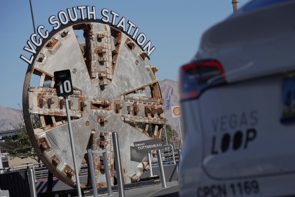 A sign directs motorists into the Vegas Loop on Wednesday, Feb. 4, 2026, in Las Vegas. (AP Photo/Ty ONeil)