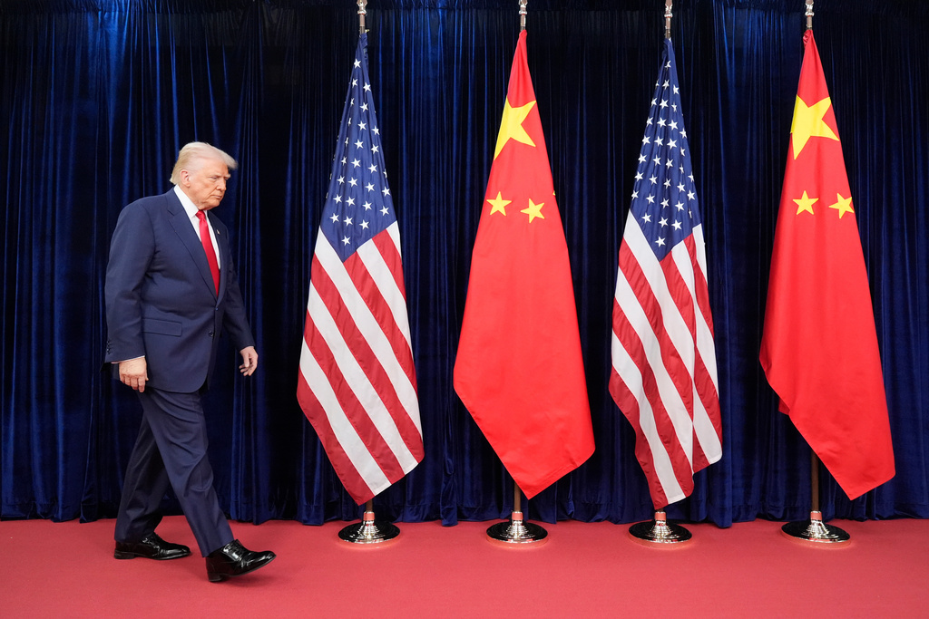President Donald Trump walking in for his meeting with and Chinese President Xi Jinping at Gimhae International Airport in Busan, South Korea, Thursday, Oct. 30, 2025. (AP Photo/Mark Schiefelbein)