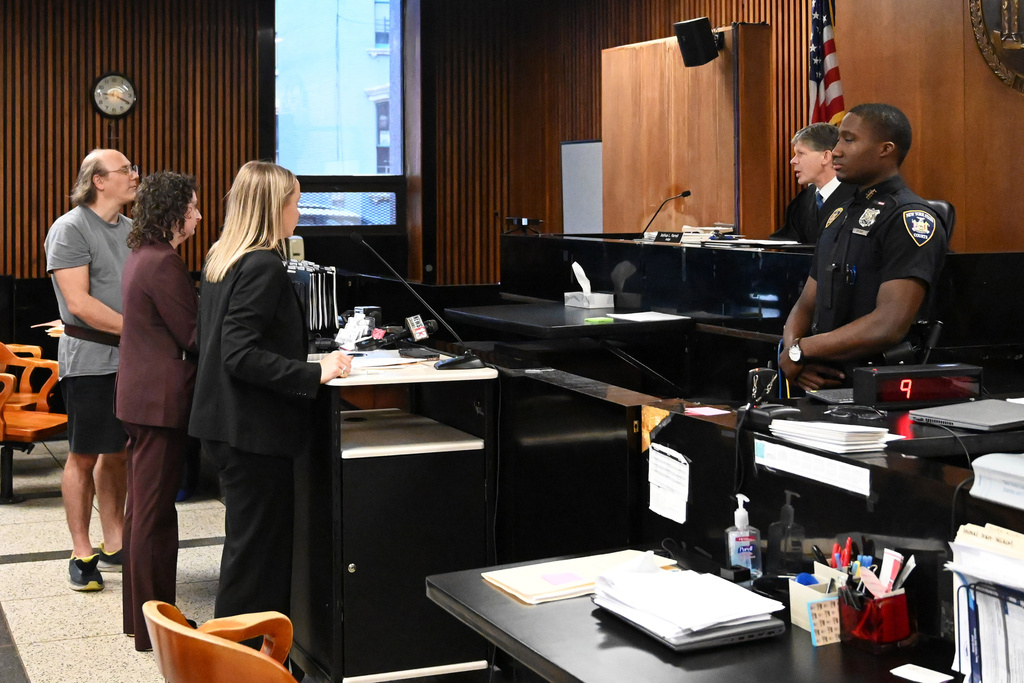 Lorenz Kraus, the 53-year-old man who was arrested for murder after telling a television news anchor that he killed his parents, is arraigned before Judge Joshua Farrell on Friday, Sept. 26, 2025, at Albany City Court in Albany, N.Y. (Will Waldron/The Albany Times Union via AP)