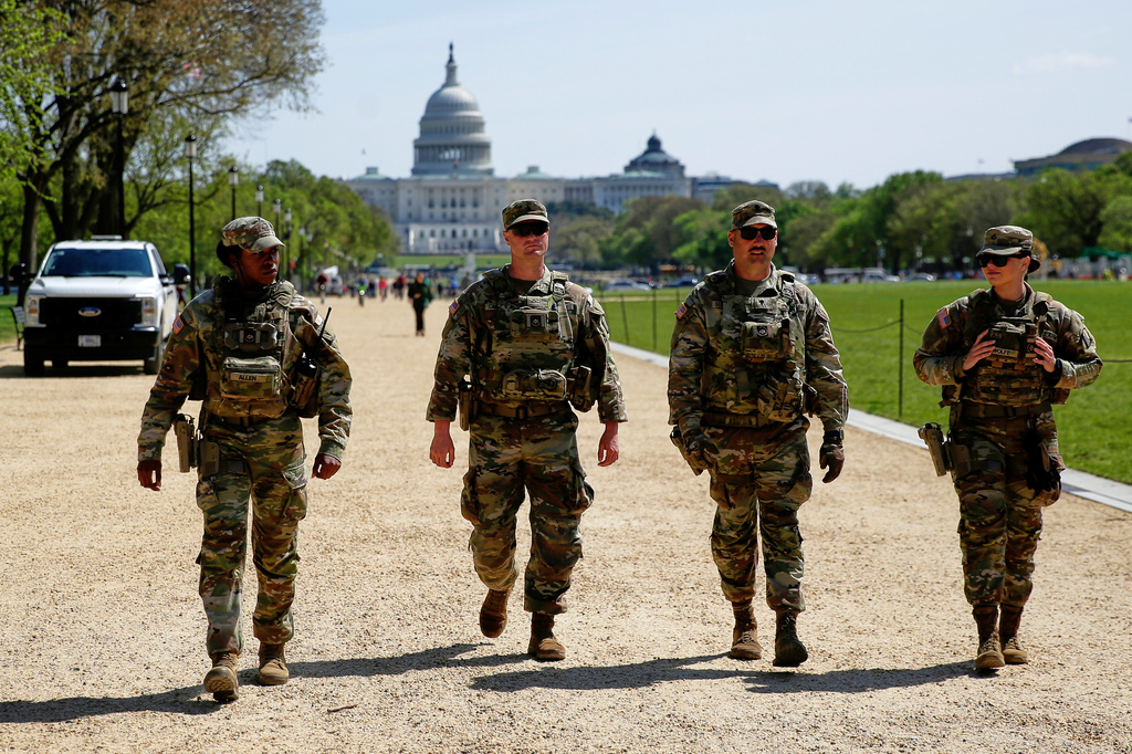 FILE National Guard patrol the Washington Mall, with the U.S. Capitol in the background, April 7, 2026, in Washington. (AP Photo/Rahmat Gul, File)