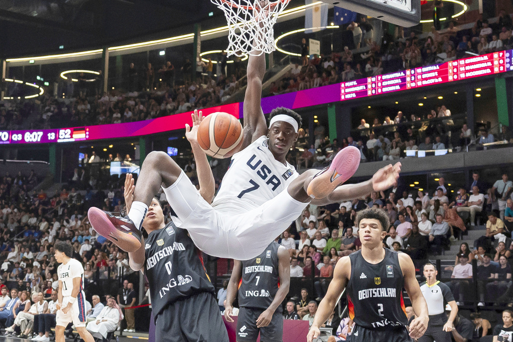 FILE - United State's Aj Dybantsa dunks during the FIBA U19 Basketball World Cup final match between the U.S. and Germany in Lausanne, Switzerland, Sunday July 6, 2025. (Cyril Zingaro/Keystone via AP, File)