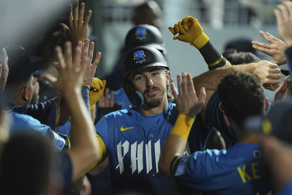 Philadelphia Phillies' Bryson Stott celebrates after hitting a two-run home run off of Kansas City Royals pitcher Taylor Clarke during the seventh inning of a baseball game, Friday, Sept. 12, 2025, in Philadelphia. (AP Photo/Matt Rourke)