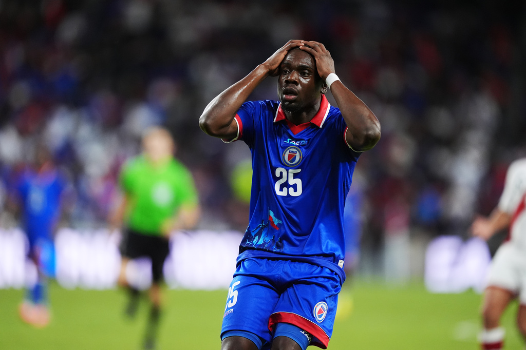 Haiti midfielder Dominique Simon reacts following an unsuccessful scoring attempt during the second half of an international friendly soccer match against Peru, Friday, June 5, 2026, in Miami. (AP Photo/Rebecca Blackwell)