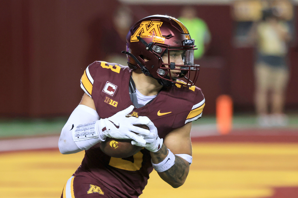 FILE - FILE - Minnesota defensive back Koi Perich runs during an NCAA football game against Iowa on Sept. 21, 2024 in Minneapolis. (AP Photo/Andy Clayton-King, File)