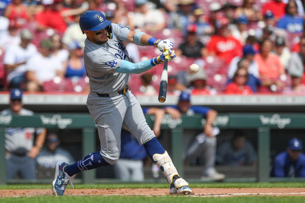 Los Angeles Dodgers' Miguel Rojas singles during the second inning of a baseball game against the Cincinnati Reds, Thursday, Sept. 17, 2026 in Cincinnati. (AP Photo/Tanner Pearson)