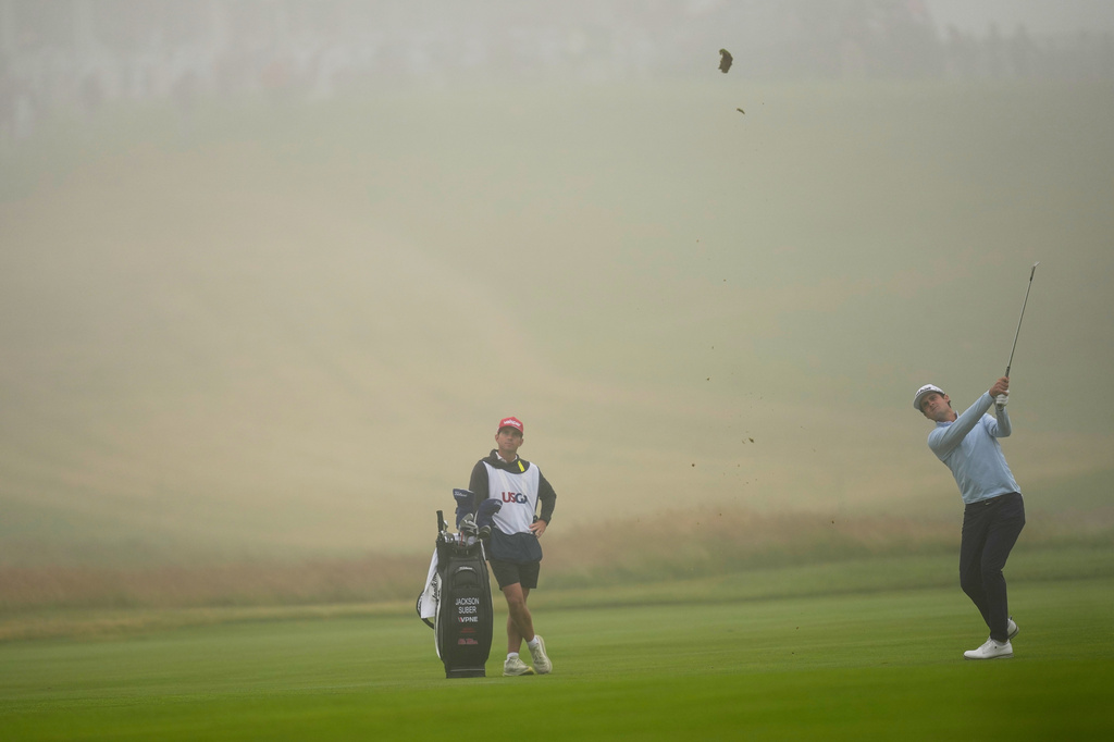 Jackson Suber hits from the fairway on the first hole during the first round of the U.S. Open golf tournament at Shinnecock Hills Golf Club in Southampton, N.Y., Thursday, June 18, 2026.(AP Photo/David J. Phillip)
