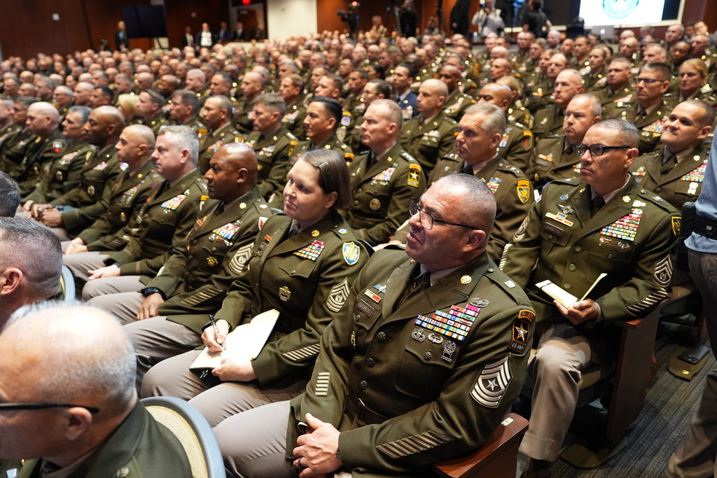 U.S. military senior leadership listen as President Donald Trump speaks at Marine Corps Base Quantico, Tuesday, Sept. 30, 2025 in Quantico, Va. (AP Photo/Evan Vucci)