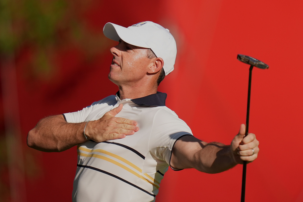 Europe's Rory McIlroy celebrates after a putt on the 15th hole during their singles match on the Bethpage Black golf course at the Ryder Cup golf tournament, Sunday, Sept. 28, 2025, in Farmingdale, N.Y. (AP Photo/Seth Wenig)