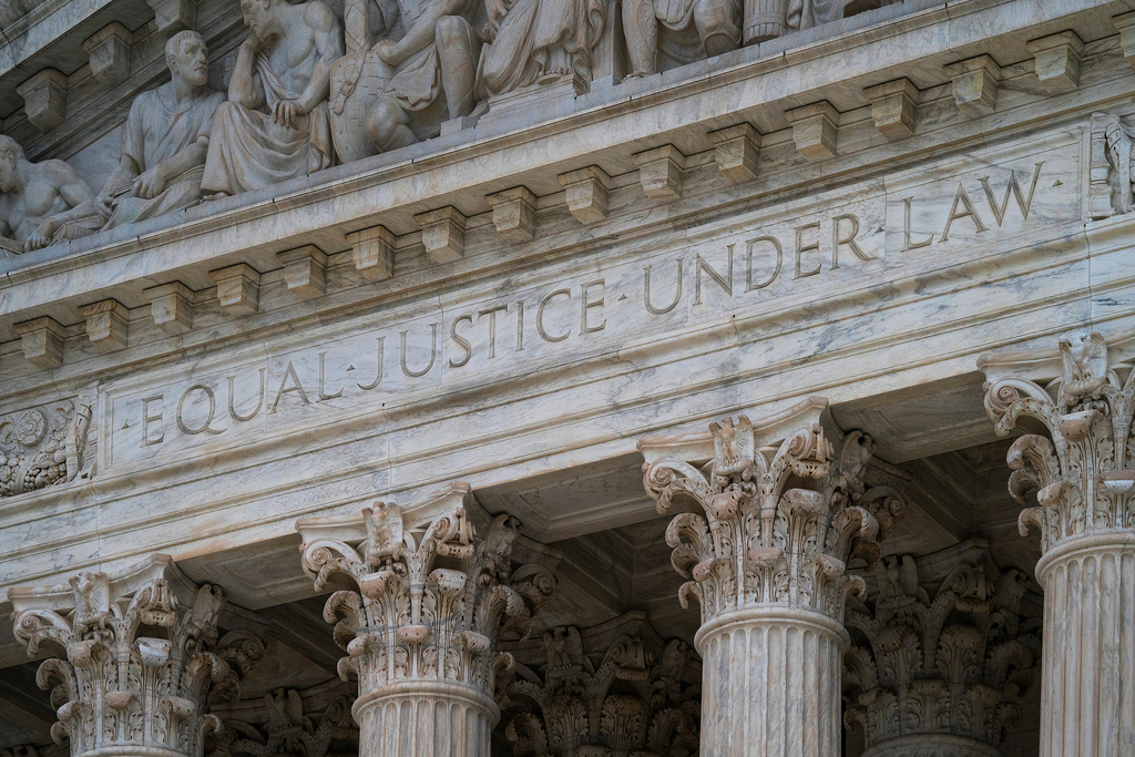 FILE - The west facade of the Supreme Court Building bears the motto "Equal Justice Under Law" on March 20, 2019, in Washington. (AP Photo/J. Scott Applewhite, File)