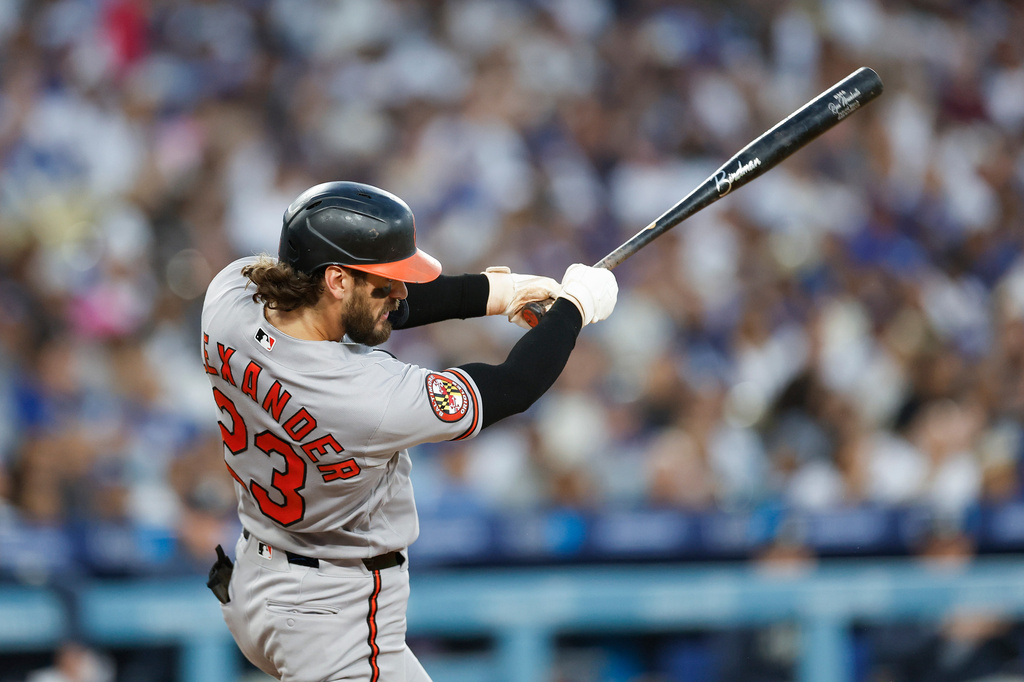 Baltimore Orioles' Blaze Alexander hits a a two-run double during the fourth inning of a baseball game against the Los Angeles Dodgers, Saturday, June 20, 2026, in Los Angeles. (AP Photo/Caroline Brehman)