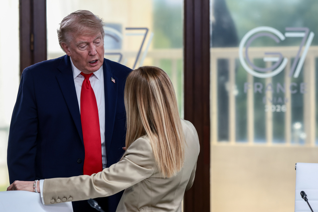 FILE - President Donald Trump speaks with Italian Prime Minister Giorgia Meloni at a working lunch with leaders of G7 and the Middle East in Evian-les-Bains, France, Tuesday, June 16, 2026. (Evelyn Hockstein/Pool Photo via AP, File)