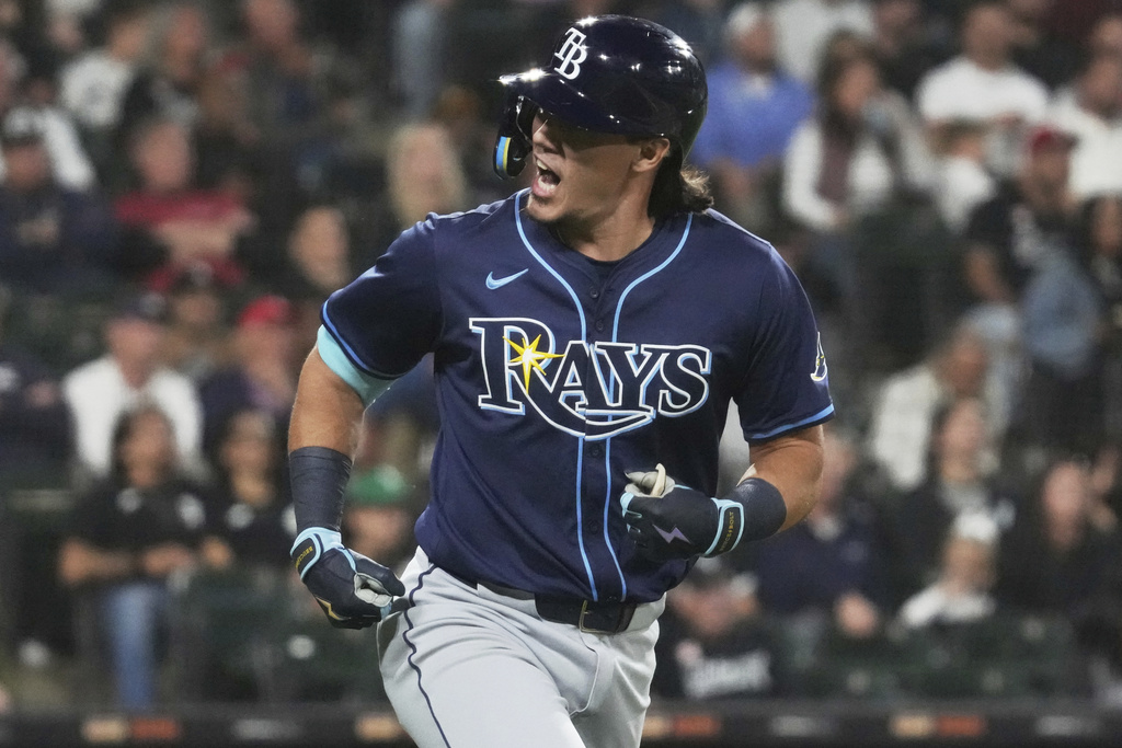 Tampa Bay Rays' Tristan Gray reacts as he rounds the bases after hitting a solo home run during the seventh inning of a baseball game against the Chicago White Sox in Chicago, Tuesday, Sept. 9, 2025. (AP Photo/Nam Y. Huh)