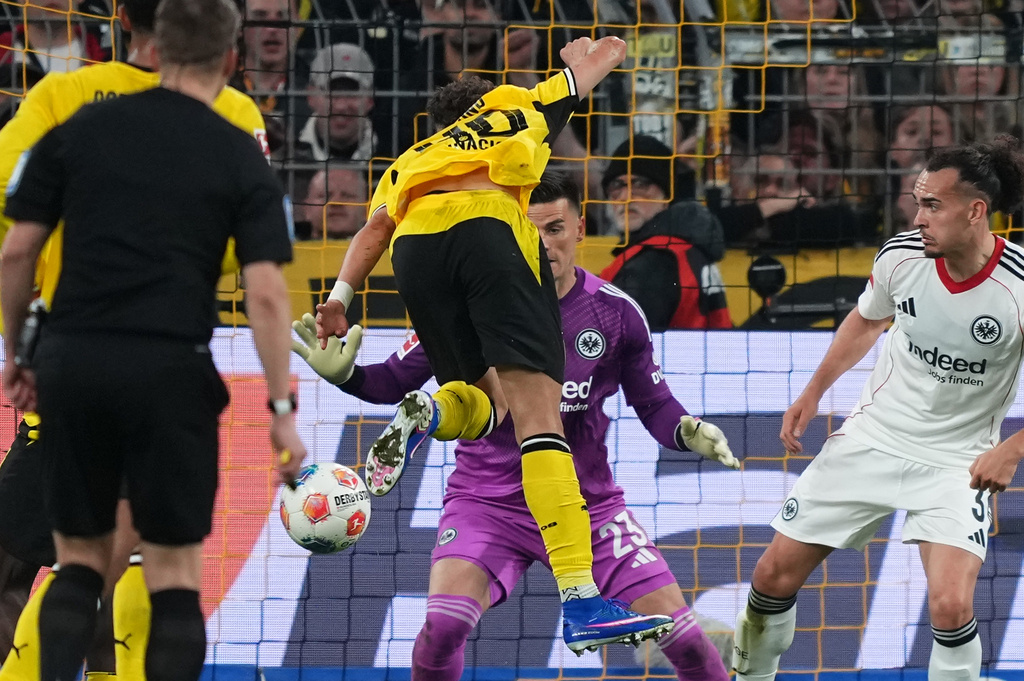 Dortmund's Samuele Inacio scores during the German Bundesliga soccer match between Borussia Dortmund and Eintracht Frankfurt in Dortmund, Germany, Friday, May 8, 2026. (AP Photo/Martin Meissner)