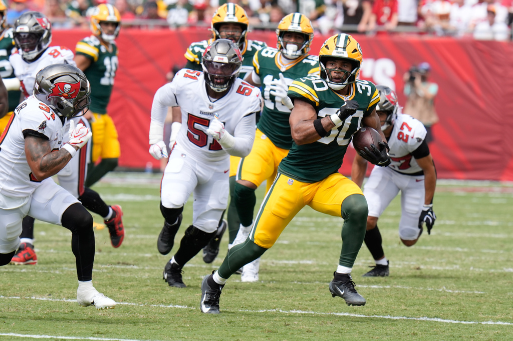 Green Bay Packers running back Chris Brooks (30) run with the ball during the first half of an NFL football game against the Tampa Bay Buccaneers in Tampa, Fla., Sunday, Oct. 4, 2026. (AP Photo/Chris O'Meara)
