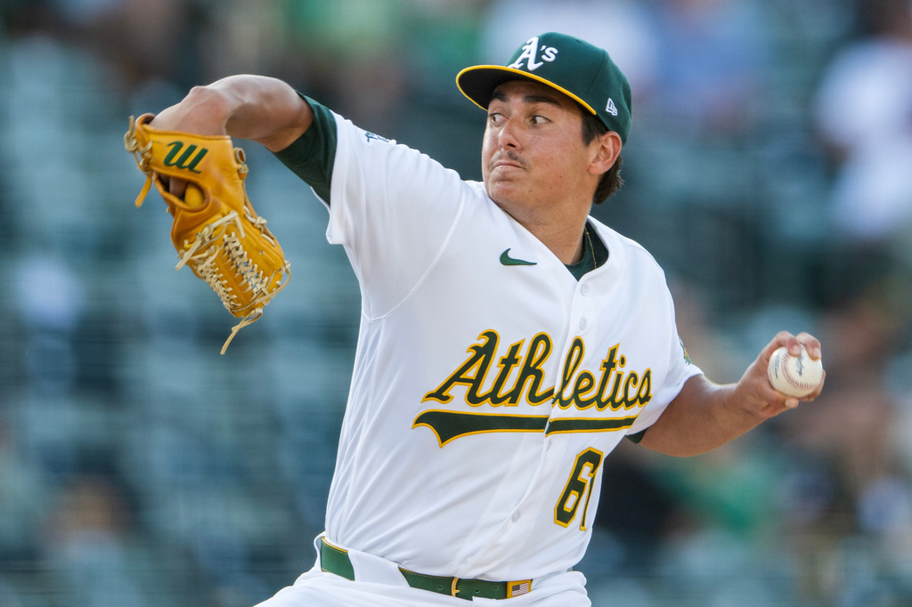 Athletics pitcher Gage Jump throws during the first inning of a baseball game against the Los Angeles Angels in West Sacramento, Calif., Thursday, June 18, 2026. (AP Photo/Nic Coury)