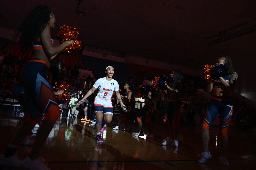 Morgan State guard Mihjae Hayes runs on to the court during player introductions before an NCAA college basketball game Wednesday, Nov 12, 2025, in Baltimore. (AP Photo/Gail Burton)