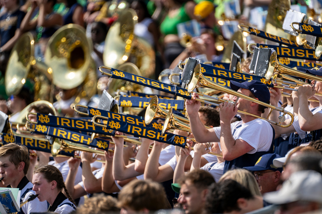 FILE - Members of Notre Dame's marching band perform during a break in an NCAA football game against Central Michigan on Saturday, Sept. 16, 2023, in South Bend, Ind. (AP Photo/Doug McSchooler, File)