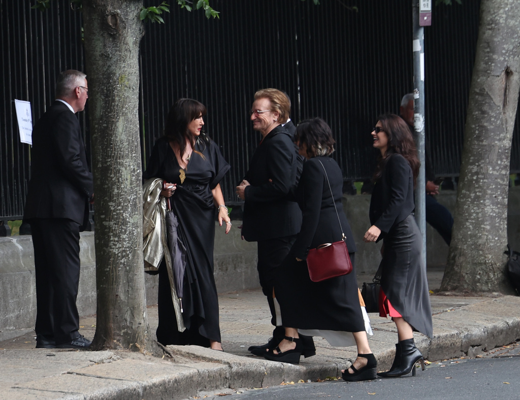 Bono arrives for the funeral of Glen Hansard at St Patrick's Cathedral in Dublin, Tuesday, Aug. 4, 2026. (Damien Eagers/PA via AP)