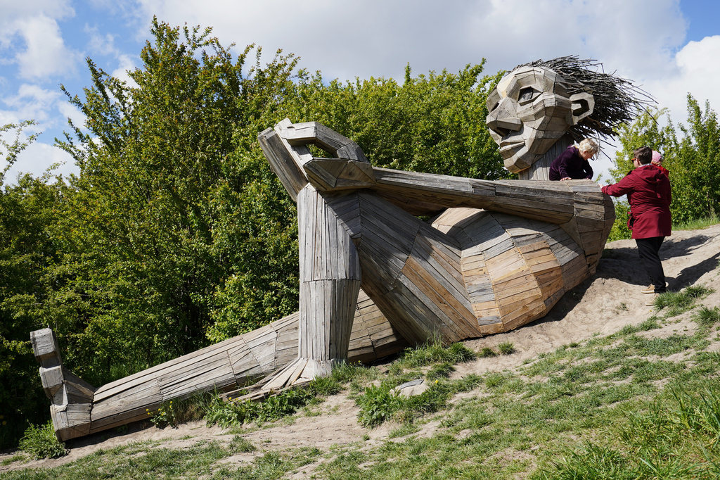 "Hill Top Trine" troll sculpture by Thomas Dambo is seen in Hvidovre, Denmark, May 14, 2026. (AP Photo/James Brooks)