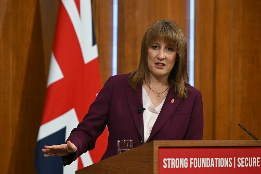 Britain's Chancellor of the Exchequer Rachel Reeves takes journalists' questions after delivering a speech in the media briefing room of 9 Downing Street, London, Tuesday Nov. 4, 2025. (Justin Tallis/Pool Photo via AP)