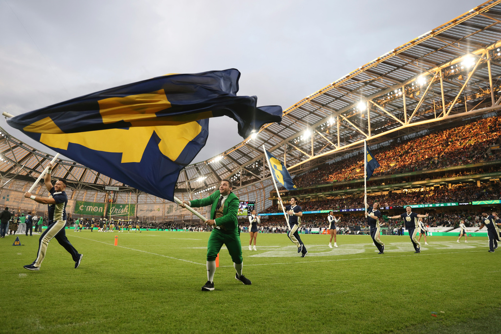 FILE - Notre Dame celebrates a score against Navy during an NCAA college football game in Dublin, Ireland, Aug. 26, 2023. (AP Photo/Peter Morrison, File)