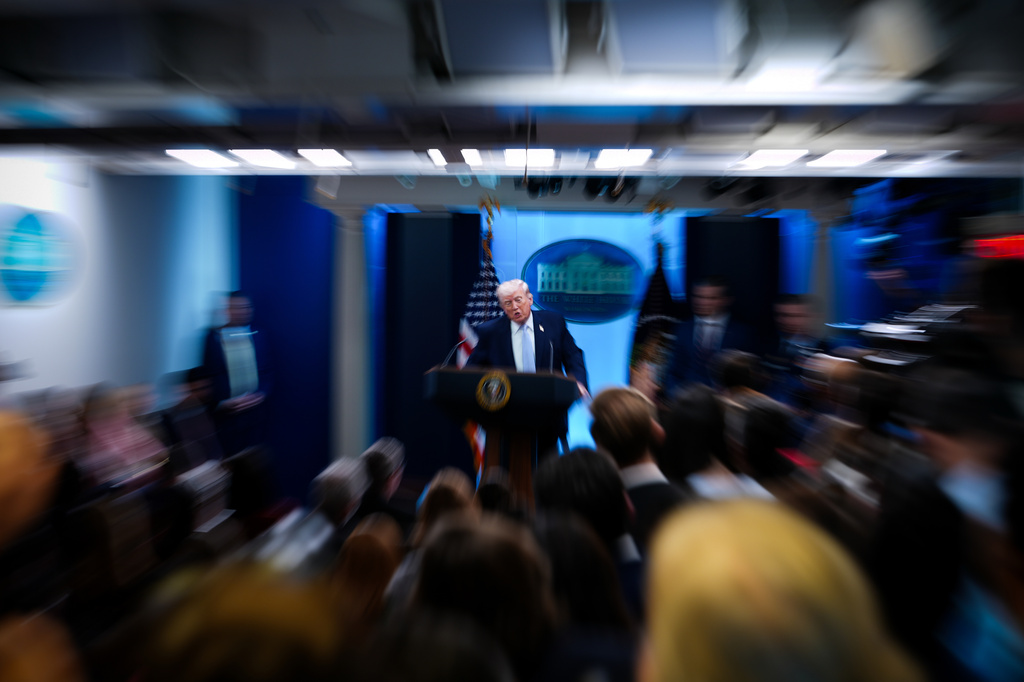 President Donald Trump, accompanied by Defense Secretary Pete Hegseth and Chairman of the Joint Chiefs of Staff Gen. Dan Caine, speaks with reporters in the James Brady Press Briefing Room at the White House, Monday, April 6, 2026, in Washington. (AP Photo/Julia Demaree Nikhinson)