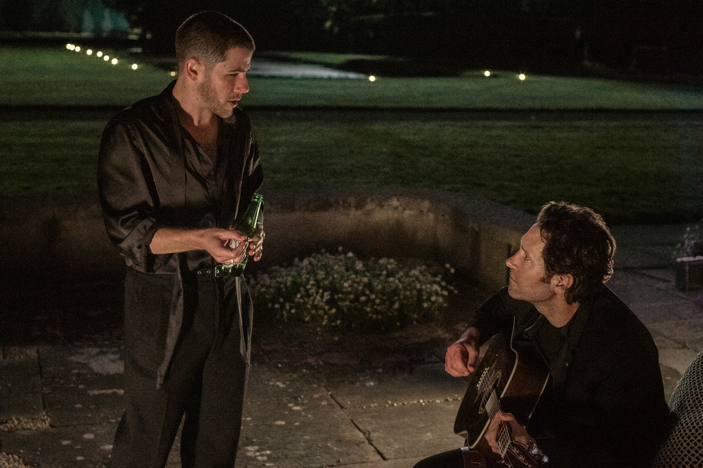 This image released by Lionsgate shows Nick Jonas, left, and Paul Rudd in a scene from "Power Ballad." (David Cleary/Lionsgate via AP)