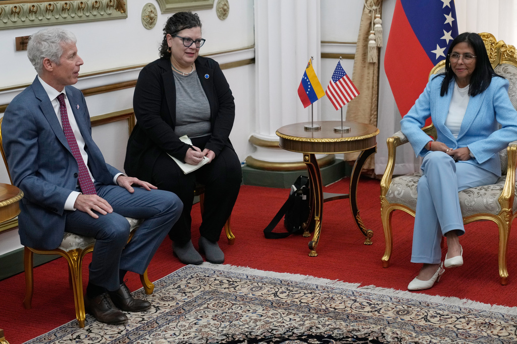 Venezuelan acting President Delcy Rodriguez, right, meets with U.S. Energy Secretary Chris Wright, left, at Miraflores presidential palace in Caracas, Venezuela, Wednesday, Feb. 11, 2026. (AP Photo/Ariana Cubillos)