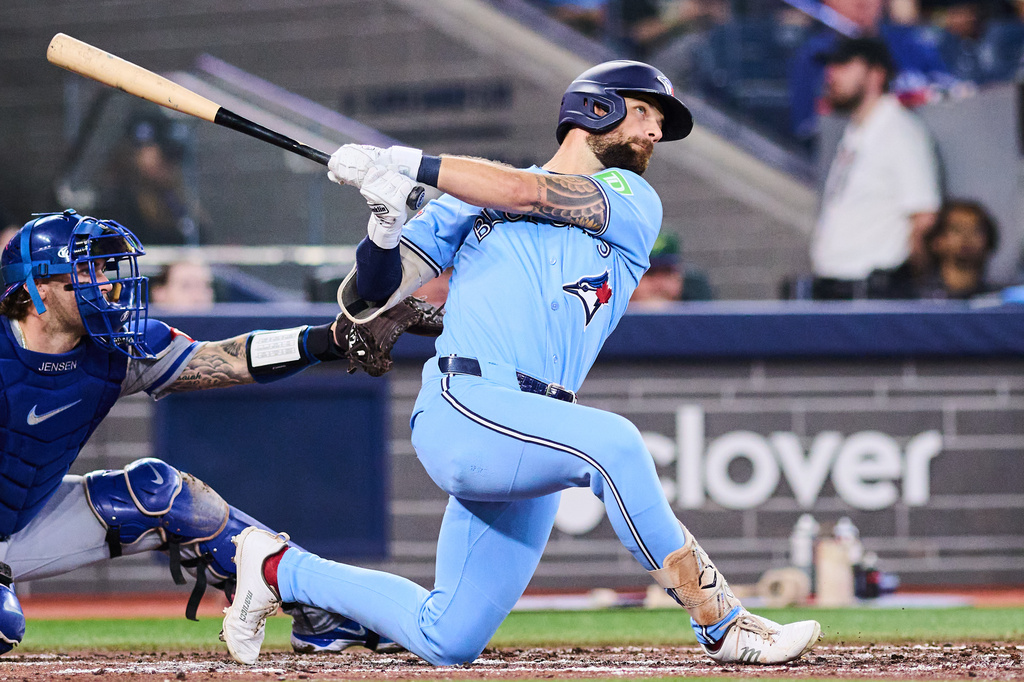 Toronto Blue Jays' Nathan Lukes (38) hits a three-run home run against the Kansas City Royals during the fourth inning of a baseball game in Toronto, Wednesday, Aug. 26, 2026. (Sammy Kogan/The Canadian Press via AP)