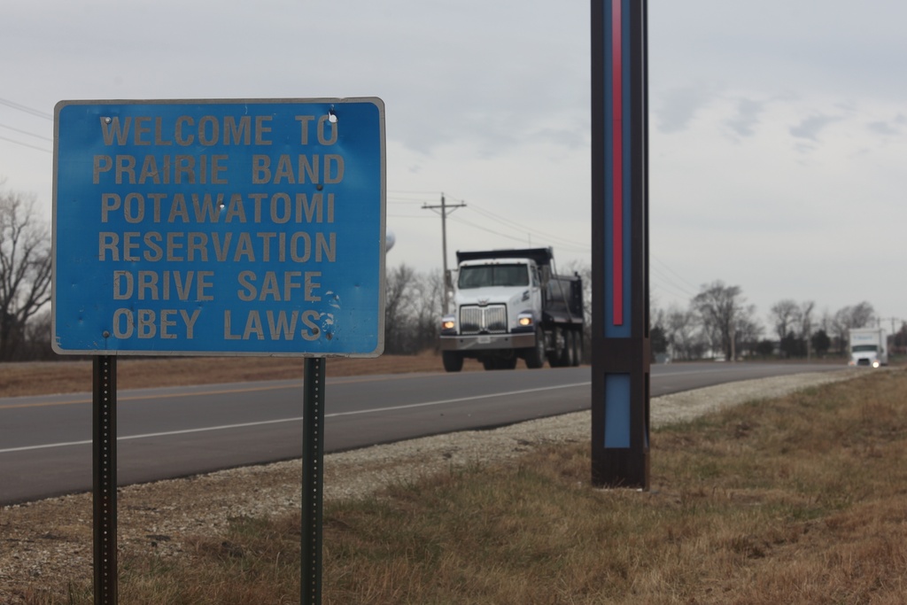 A sign on a road off of U.S. Highway 75 welcomes motorists to the Prairie Band Potawatomi reservation, outside Mayetta, Kan., Thursday, Dec. 11, 2025. (AP Photo/John Hanna)