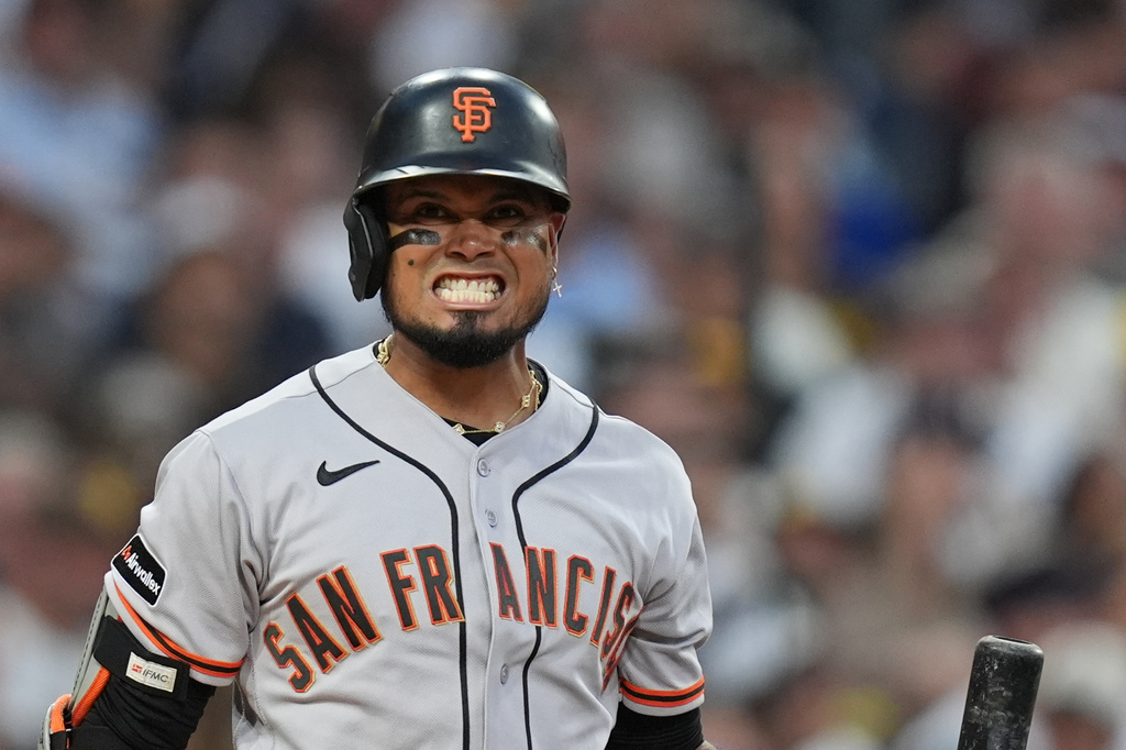 San Francisco Giants' Luis Arraez reacts while batting during the fourth inning of a baseball game against the San Diego Padres Thursday, July 30, 2026, in San Diego. (AP Photo/Gregory Bull)