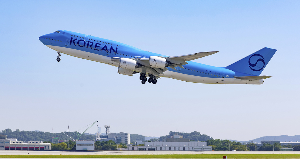 A Korean Air chartered plane takes off to bring back Korean workers detained in an immigration raid in Georgia, at Incheon International Airport, South Korea, Wednesday, Sept. 10, 2025. (Yonhap via AP)