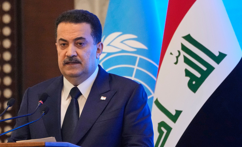 Iraqi prime minister Mohammed Shia al-Sudani speaks during an event to mark the end of the U.N. political mission in Baghdad, Iraq, Saturday, Dec. 13, 2025. (AP Photo/Hadi Mizban)