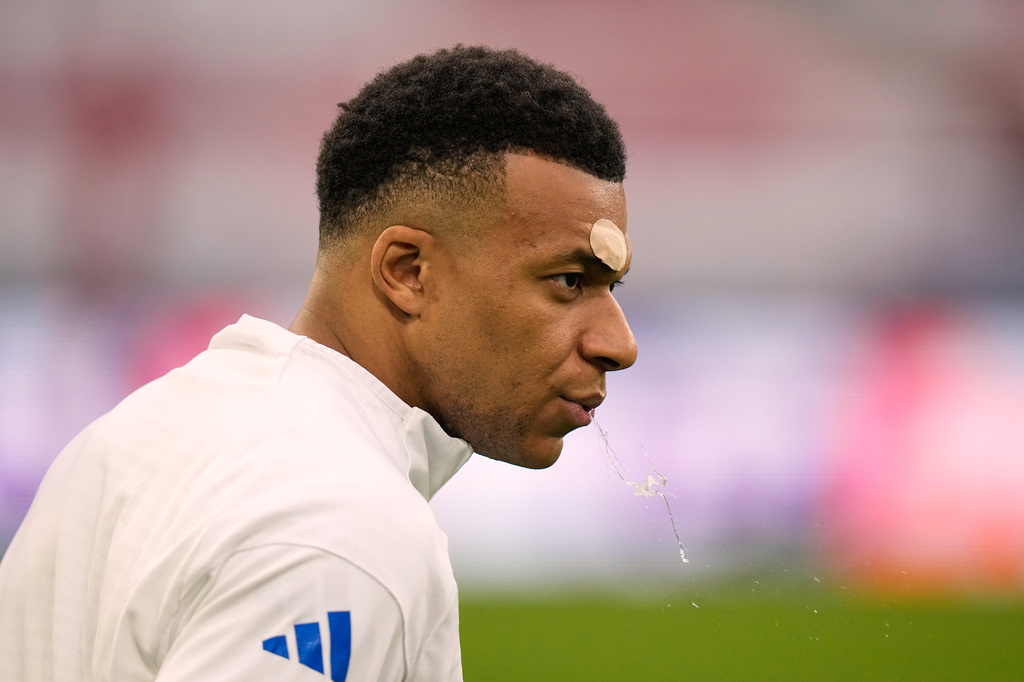 Real Madrid's Kylian Mbappe reacts during a training session ahead of the Champions League quarterfinal second leg soccer match between Bayern Munich and Real Madrid in Munich, Germany, Tuesday, April 14, 2026. (AP Photo/Matthias Schrader)