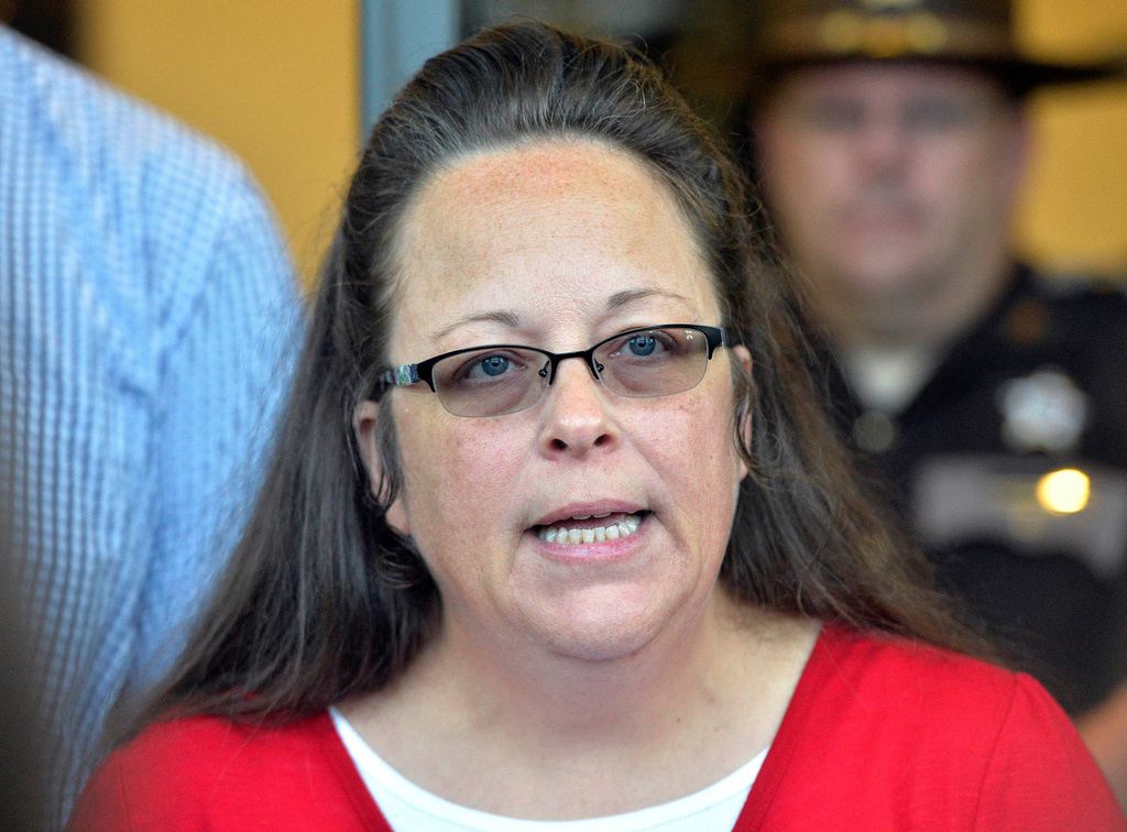 FILE - Rowan County Clerk Kim Davis makes a statement to the media at the front door of the Rowan County Judicial Center in Morehead, Ky. Sept. 14, 2015. (AP Photo/Timothy D. Easley, File)