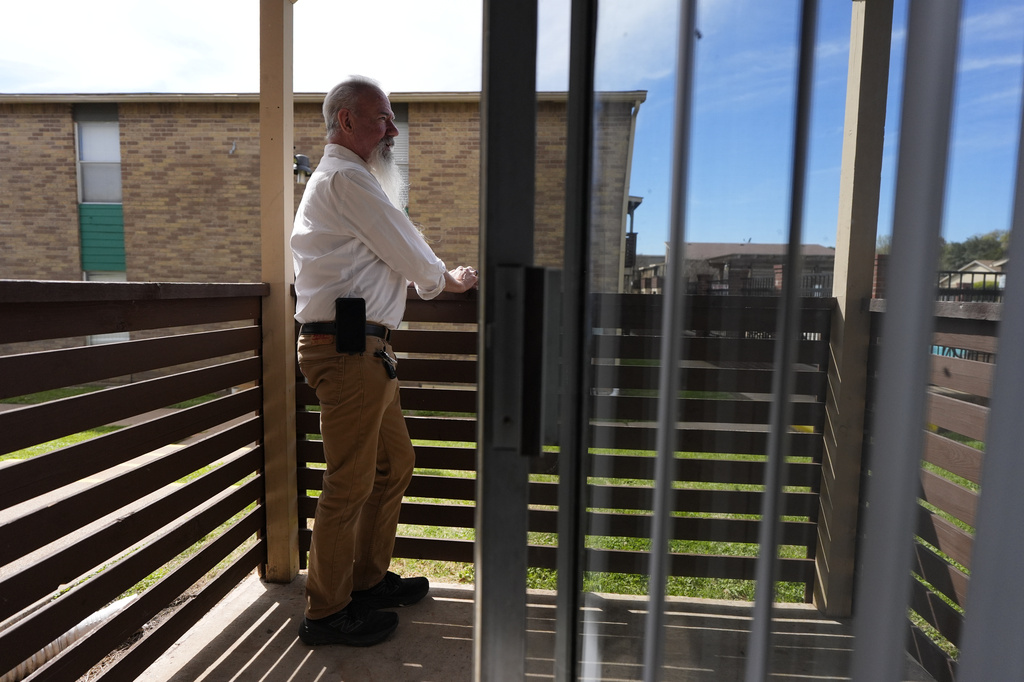 Matthew Haines, owner of the Oakwood Apartments, poses for a photo at the comminty housing location in Arlington, Texas, Tuesday, March 17, 2026. (AP Photo/Tony Gutierrez)