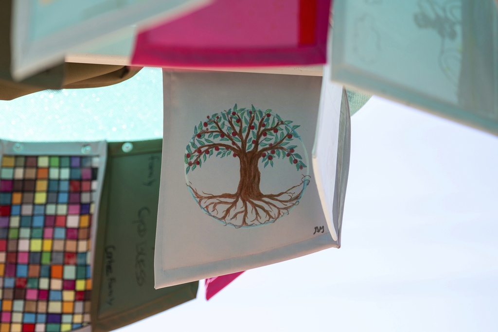 Reflections on Sunnyslope, an art piece by Jessica Arias that also functions as a shade structure, stands at Sunnyslope Park in Phoenix, Saturday, Aug. 30, 2025. (AP Photo/Samantha Chow)