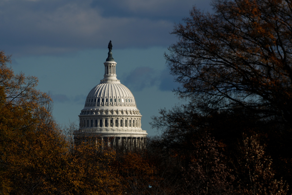 The U.S. Capitol is seen from the base of the Washington Monument, Friday, Nov. 28, 2025, in Washington. (AP Photo/Julia Demaree Nikhinson)