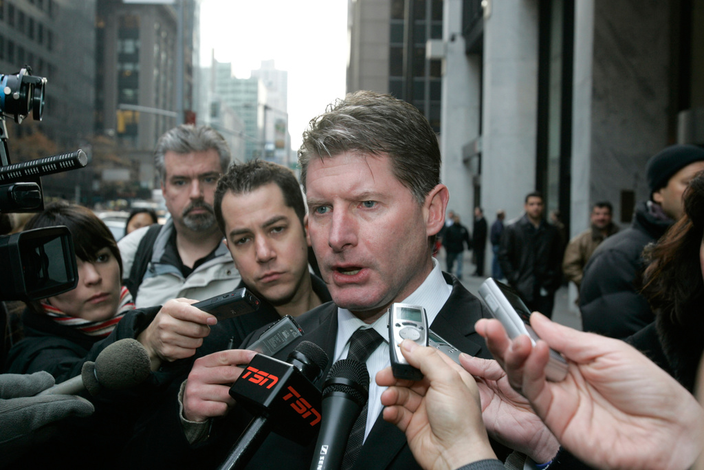FILE - Glenn Healy responds to questions from the media after a meeting at NHL headquarters, Dec. 4, 2008, in New York. (AP Photo/Frank Franklin II)