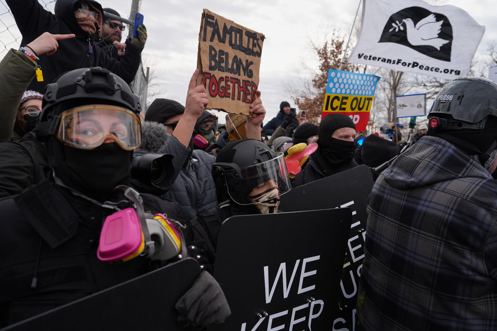 Counterprotesters demonstrate against Jake Lang on Saturday, Feb. 7, 2026, in Minneapolis. (AP Photo/Ryan Murphy)